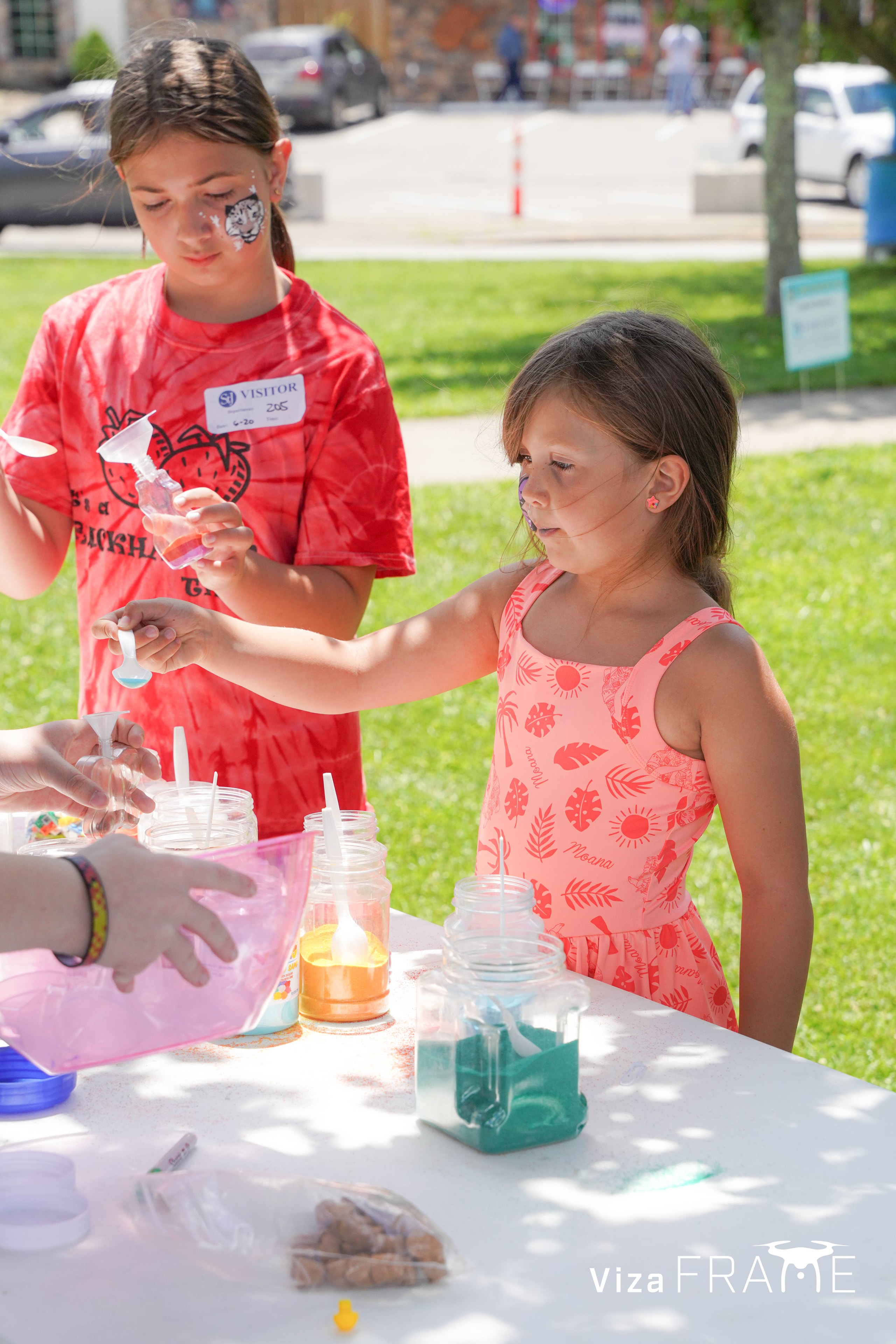 Kids creating at the sand art station- what will you create?